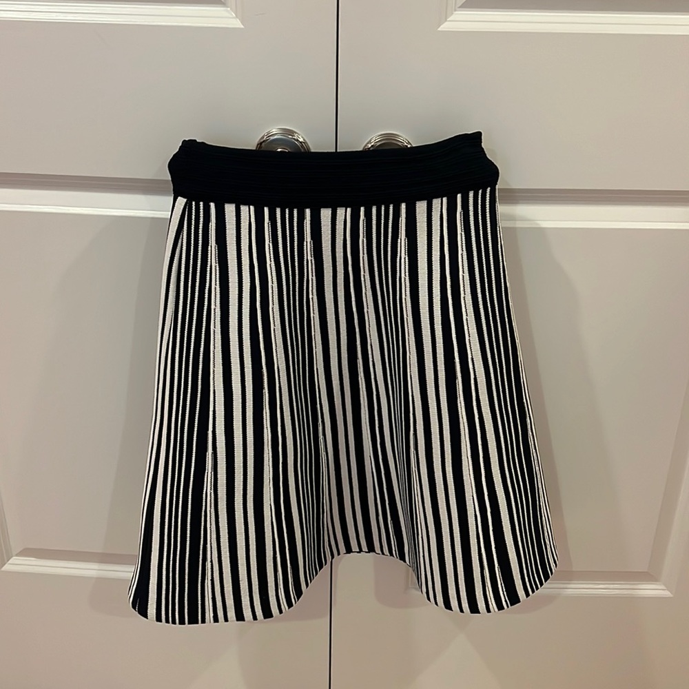 O 2nd below the knee length skirt